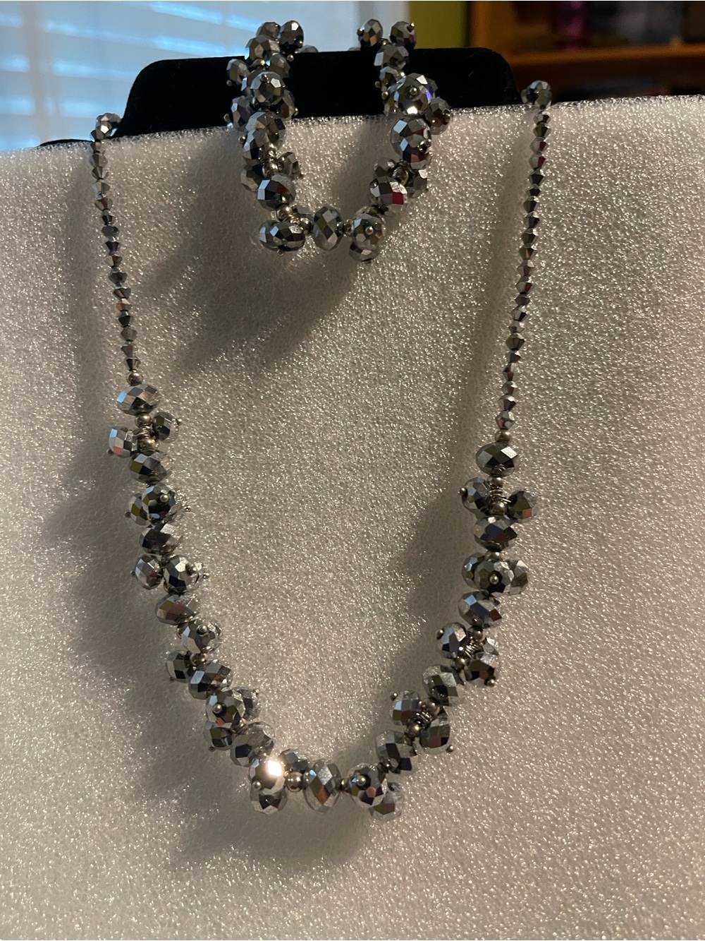 Elegant Silver Faceted Bead Necklace with Earrings and sparkly bracelet set.